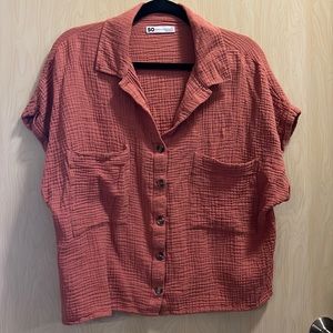 Orange/Peach flowing button up shirt